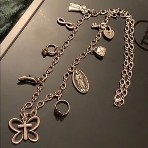 James aver necklace 22’ with 8 charms, 1 pendant.
